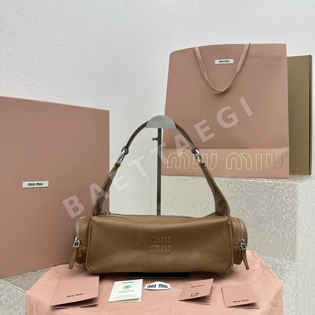 미우미우 카라멜 빈티지 바이크 가방 68101