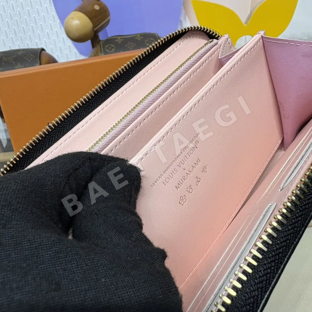 루이비통 쿠쌍 모노그램 지퍼업 지갑 상세 이미지 8