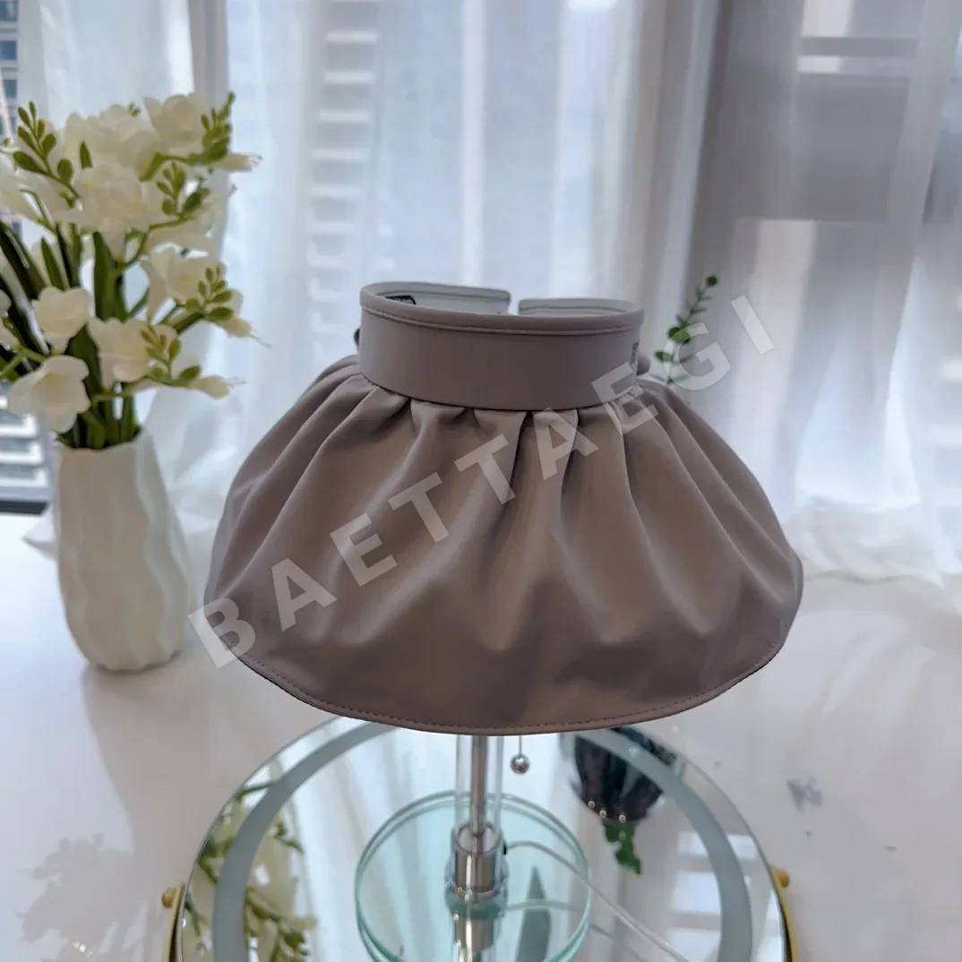 발렌시아가 조개껍데기 선바이저 모자 81640