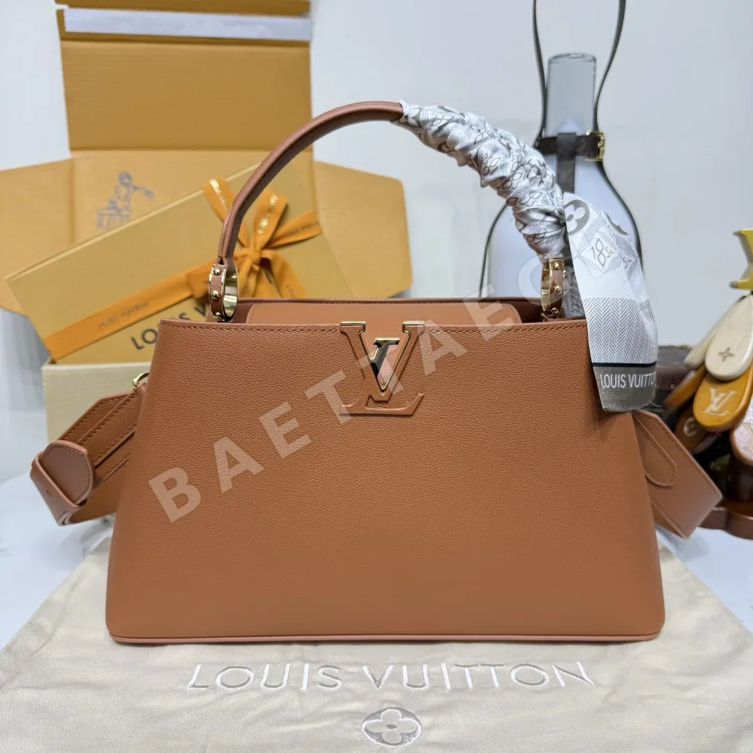 루이비통 카프시느 수플르 미디엄 핸드백 M14370
