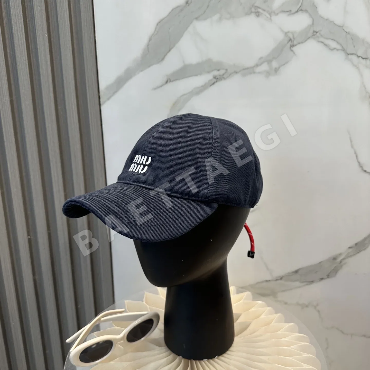 미우미우 컬러풀 드로스트링 캡 120354