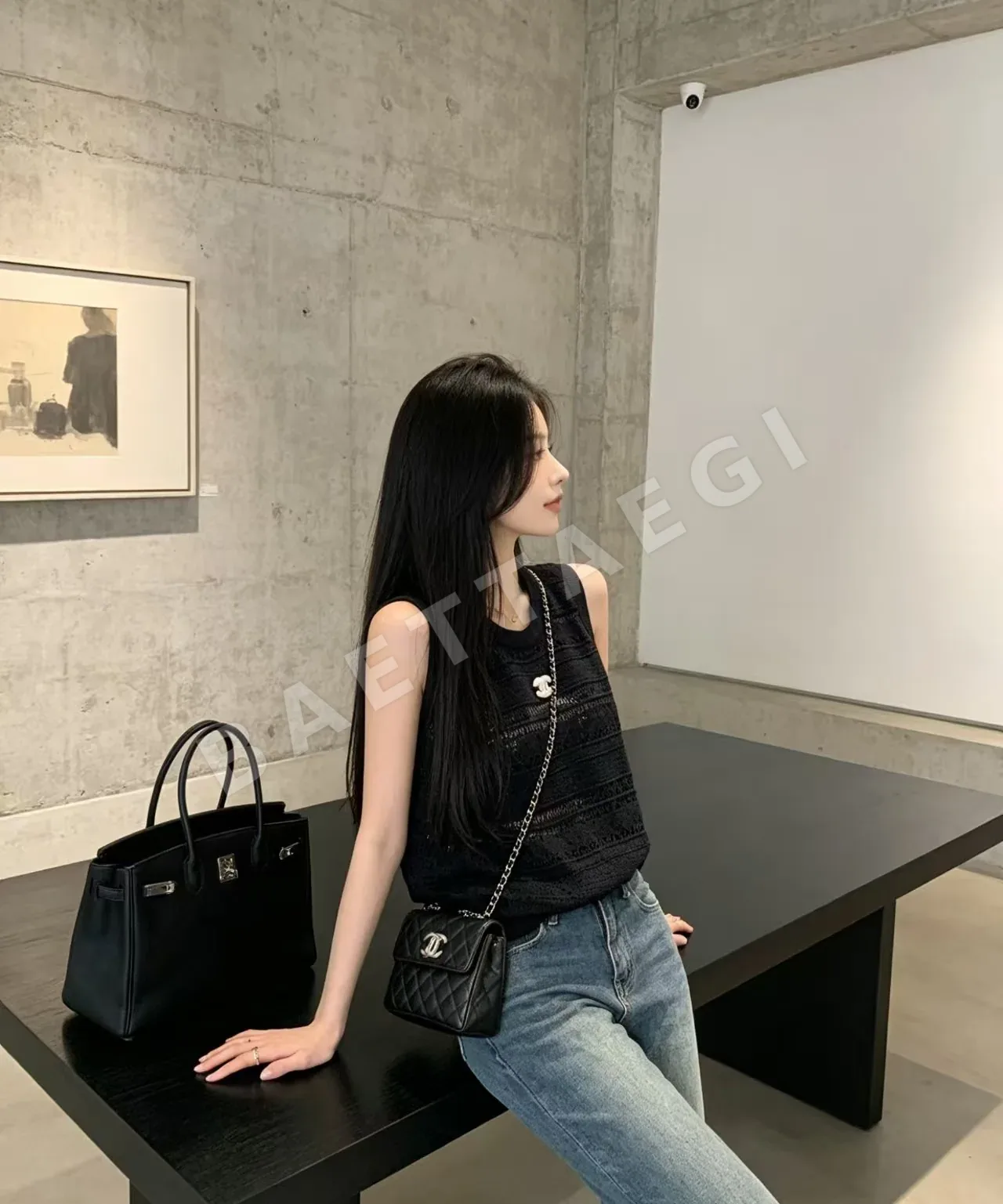 샤넬 투각 무늬 니트 반팔 베스트 103877