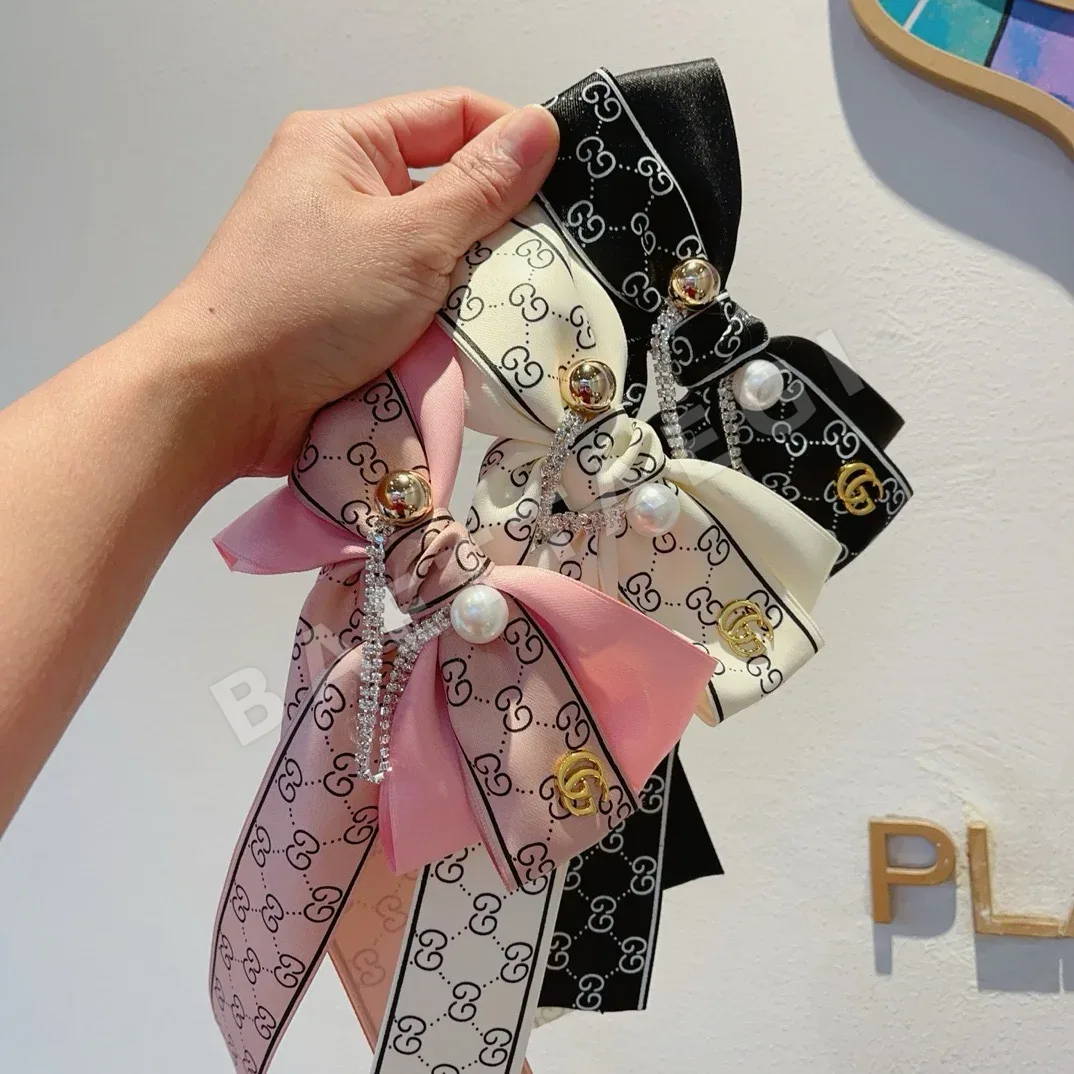 구찌 더블 G 리본 헤어클립 상세 이미지 8