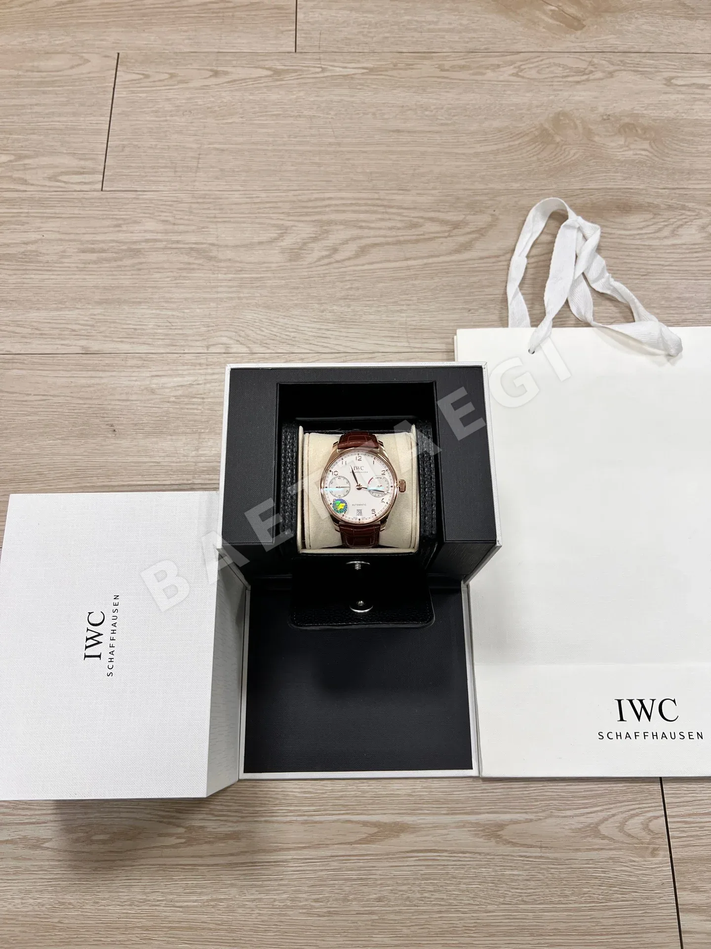 IWC 포르투기저 7 데이즈 로즈골드 남성 시계
